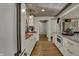 Bright open kitchen featuring butcher block countertops, stainless appliances, and hardwood floors at 601 Ridge Rd, Greenwood, IN 46142