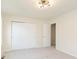 This bedroom features neutral carpet, a modern light and large closet at 6156 N Cedarwood Dr, McCordsville, IN 46055