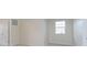 Bright bedroom with closet, neutral carpet, and window providing natural light at 6156 N Cedarwood Dr, McCordsville, IN 46055