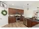 Kitchen with stainless steel appliances and ample cabinet space at 6156 N Cedarwood Dr, McCordsville, IN 46055