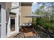 Spacious second-story back deck with modern patio furniture and scenic views at 675 Greenford N Trl, Carmel, IN 46032
