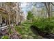 Backyard view with mature landscaping and privacy; backs up to natural area at 675 Greenford N Trl, Carmel, IN 46032