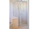 A tile shower with glass door and bench seating at 6967 Bluffridge Way, Indianapolis, IN 46278