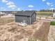 Aerial view of new construction home with patio set in new development at 7167 Finley Creek Dr, Whitestown, IN 46075