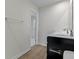 Bathroom with modern fixtures, a white countertop vanity, and wood-look flooring at 7167 Finley Creek Dr, Whitestown, IN 46075