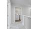 Upstairs laundry room featuring a washer and dryer and metal shelving at 7167 Finley Creek Dr, Whitestown, IN 46075