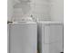 Convenient laundry room with modern washer and dryer units and ample storage space at 7167 Finley Creek Dr, Whitestown, IN 46075