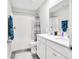 Beautiful bathroom with a double vanity, shower with a tub, and modern fixtures at 8546 Strabet Dr, Pendleton, IN 46064