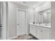 Bright bathroom with a double sink vanity, white cabinets, and modern fixtures at 8546 Strabet Dr, Pendleton, IN 46064
