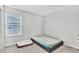 Unfurnished bedroom with natural light, a minimalist mattress, and a cozy dog bed creating a versatile space at 8546 Strabet Dr, Pendleton, IN 46064