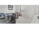 Modern bedroom with a desk and chair and a small window that lets in plenty of natural light at 8546 Strabet Dr, Pendleton, IN 46064