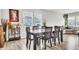 Inviting dining area featuring a wood table, chairs, and large windows for natural light at 8546 Strabet Dr, Pendleton, IN 46064