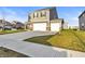 Charming two-story home with a spacious driveway and well-manicured lawn enhancing curb appeal at 8546 Strabet Dr, Pendleton, IN 46064
