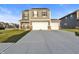 Charming two-story home features a spacious driveway, two-car garage, and well-maintained lawn at 8546 Strabet Dr, Pendleton, IN 46064