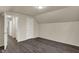 Bedroom featuring new vinyl flooring, white trim and neutral paint at 8553 Broadway St, Indianapolis, IN 46240
