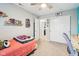 Bright bedroom with a ceiling fan, closet, and decor shelves offering modern comfort and style at 8663 Kellner St, Pendleton, IN 46064