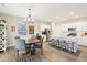 A bright kitchen and dining area are open and inviting with stainless appliances at 8663 Kellner St, Pendleton, IN 46064