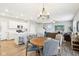 Open floor plan features a living room connected to the modern kitchen and dining room at 8663 Kellner St, Pendleton, IN 46064