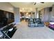 Open living space features large flatscreen tv and an electric recliner sofa set on carpet at 944 Redwood Dr, Franklin, IN 46131