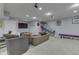 Basement featuring a comfortable lounge area and fun sport-themed activities at 9760 Logan Ln, Fishers, IN 46037