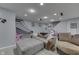 Cozy finished basement featuring carpet, recessed lighting, and comfortable seating area for Gathering entertainment at 9760 Logan Ln, Fishers, IN 46037