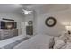 Bright main bedroom with vaulted ceiling, ensuite bath, and carpeted floors at 9760 Logan Ln, Fishers, IN 46037