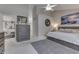 Bright main bedroom with vaulted ceiling, ensuite bath, and carpeted floors at 9760 Logan Ln, Fishers, IN 46037