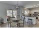 Breakfast nook and kitchen featuring a slider to the backyard at 9760 Logan Ln, Fishers, IN 46037