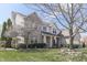 Beautiful brick home with well-maintained landscaping and mature trees in a peaceful neighborhood at 9760 Logan Ln, Fishers, IN 46037