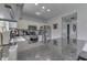 Well-lit kitchen features stainless steel appliances, granite countertops, and ample cabinet space at 9760 Logan Ln, Fishers, IN 46037