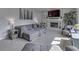 Relaxing living room with a brick fireplace and open space at 9760 Logan Ln, Fishers, IN 46037