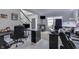 The office has neutral carpet and multiple computer setups at 9760 Logan Ln, Fishers, IN 46037