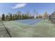 Community tennis court for exercise and recreational play for community residents at 9760 Logan Ln, Fishers, IN 46037
