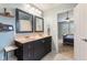 Well-lit double vanity in Primary bathroom with modern fixtures and adjoining bedroom access at 1014 Sugar Maple Dr, Greenwood, IN 46143