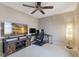 A bedroom features a ceiling fan, a window, neutral walls, and carpet at 1014 Sugar Maple Dr, Greenwood, IN 46143
