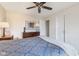 This main bedroom is well-lit, with a beautiful bed, side tables, and ample closet space at 1014 Sugar Maple Dr, Greenwood, IN 46143