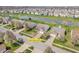Aerial view showcasing the property at 10844 Tedder Lake Drive, with nearby ponds and landscaping at 10844 Tedder Lake Dr, Indianapolis, IN 46239