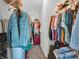 Spacious walk-in closet with ample shelving and hanging space for organized storage at 10844 Tedder Lake Dr, Indianapolis, IN 46239