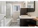 Bathroom featuring new tile floor, modern fixtures, and a shower-tub combination at 1234 E 71St St, Indianapolis, IN 46220