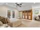 Cozy bedroom with backyard views, custom built-ins, and an elegant desk at 1234 E 71St St, Indianapolis, IN 46220