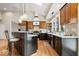 Open kitchen features an island, stainless appliances, and lots of natural light at 1234 E 71St St, Indianapolis, IN 46220
