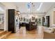 Spacious kitchen featuring stainless steel appliances, a center island with bar seating, and ample natural light at 1234 E 71St St, Indianapolis, IN 46220
