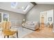 Comfortable living room with hardwood floors, skylights, modern decor, and an inviting atmosphere at 1234 E 71St St, Indianapolis, IN 46220