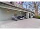Inviting patio featuring stylish furniture, overhead lights, and a seamless transition to the interior via glass doors at 1234 E 71St St, Indianapolis, IN 46220