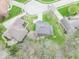 Overhead view of homes showcasing landscaping, patios, and neighborhood layout with cul-de-sac at 130 George Ct, Danville, IN 46122
