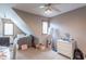 Cozy secondary bedroom with sloped ceilings, natural light, and neutral walls at 130 George Ct, Danville, IN 46122