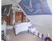 Cozy bedroom features natural light from window and neutral toned walls, perfect for relaxation at 130 George Ct, Danville, IN 46122