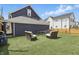 Spacious backyard featuring artificial turf, and stylish outdoor furniture; great for relaxing at 1321 Union St, Indianapolis, IN 46225