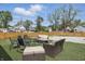 Backyard featuring artificial turf and stylish outdoor furniture arrangements for relaxing at 1321 Union St, Indianapolis, IN 46225