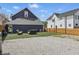 Spacious backyard with modern gravel and synthetic grass, perfect for outdoor gatherings at 1321 Union St, Indianapolis, IN 46225